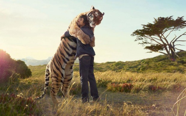 man_and_tiger_hug